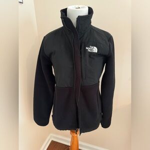 Women’s black North Face fleece jacket.